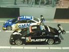 Vectra C DTM 2005 Bild 2

Hersteller: Minichamps
blauweissorange 2.016 mal KW19/06,
schwarz 3.024 mal KW 18/06

Zum Original:
Fässler (blauweissorange) und Aiello (schwarz) waren zwei von 4 letzten Werksfahrern. Dies war zugleich die letzte Saison für Opel bei der DTM, denn ab 2006 sperrte GM eine weitere Teilnahme.